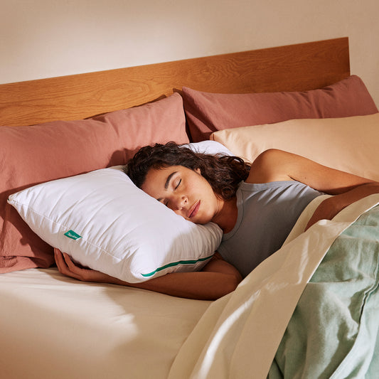 Women sleeps comfortably on her Marlow pillow.